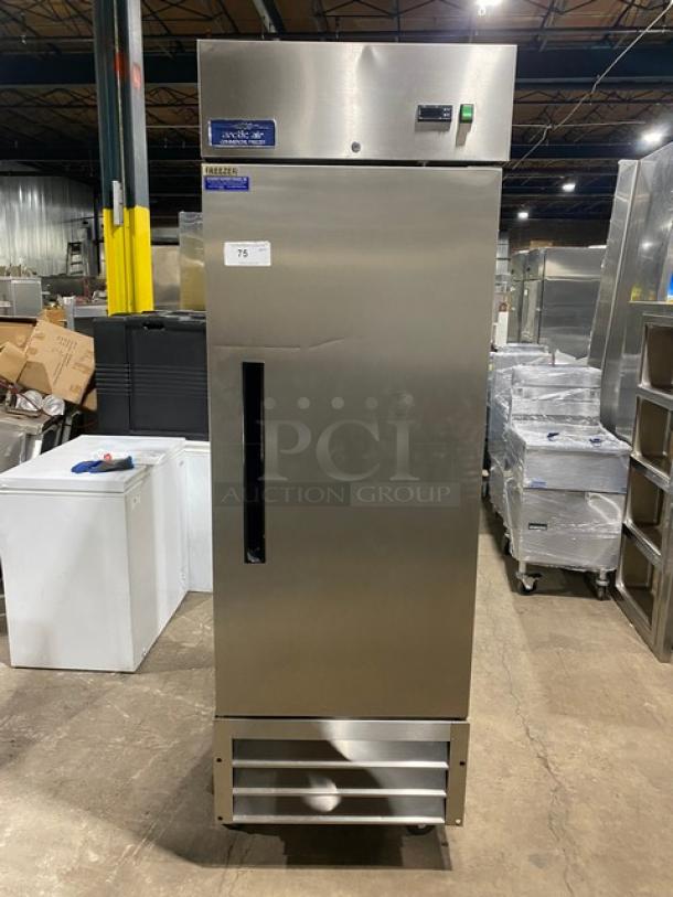 Artic Air AF23 commercial stainless steel single door reach-in freezer, poly coated wire racks, on casters, 115V, SN: 253187.