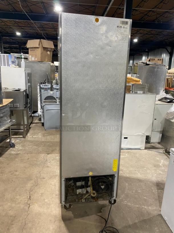 Artic Air AF23 stainless steel solid single door reach-in freezer, model AF23, on casters, with poly-coated wire racks, 115V.