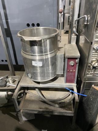 Southbend KECT-10 10-gal. electric tilting steam kettle with swing spout faucet, undershelf base, on legs, in used condition.