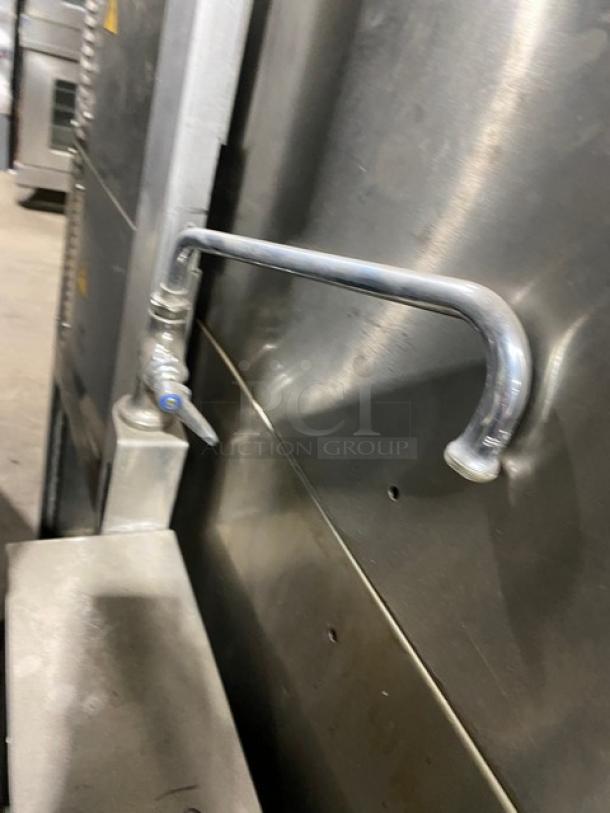 Southbend KECT-10 10-Gal. Stainless Steel Tilting Steam Kettle with swing spout faucet, single undershelf base, on legs.