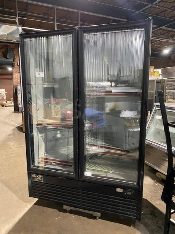 Kool-It Signature Series black double glass swing door merchandiser freezer, model 163LX46FB, with wire racks and casters.