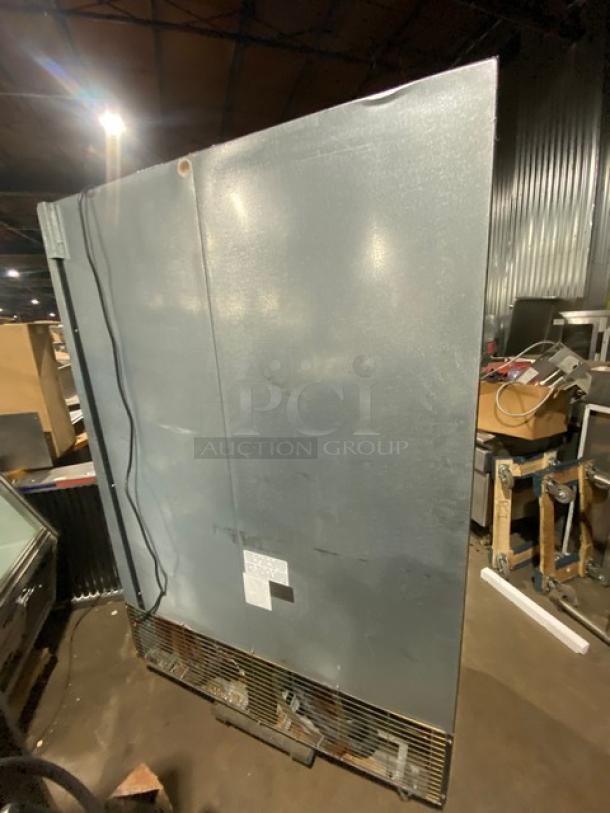 Kool-It 2021 commercial double glass door freezer, model 163LX46FB, black finish, with poly-coated wire racks and casters.