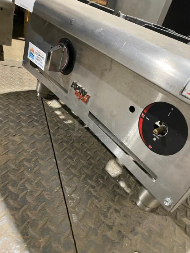 APW Wyott Workline Series 2 Burner Stainless Steel Hot Plate, Model GHPW-2i, on legs with control knobs and visible brand logo.