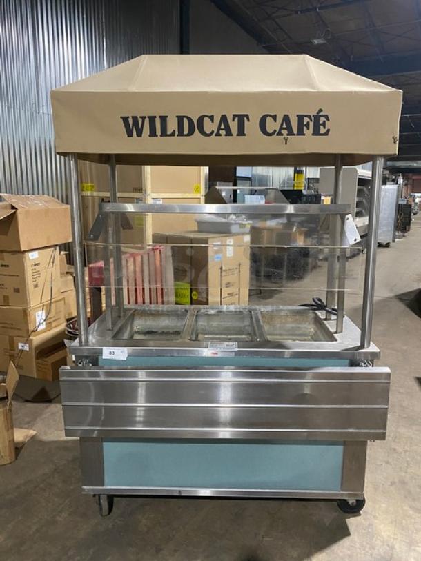 Piper Products stainless steel 3-well hot food table, model 3HF, with sneeze guard, tray slide, and "Wildcat Café" awning.