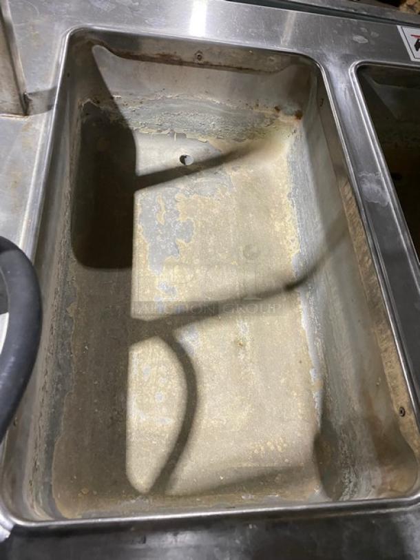 Piper Products stainless steel 3-well hot food/steam table, Model 3HF, with wear in wells. Features foldable tray slide.