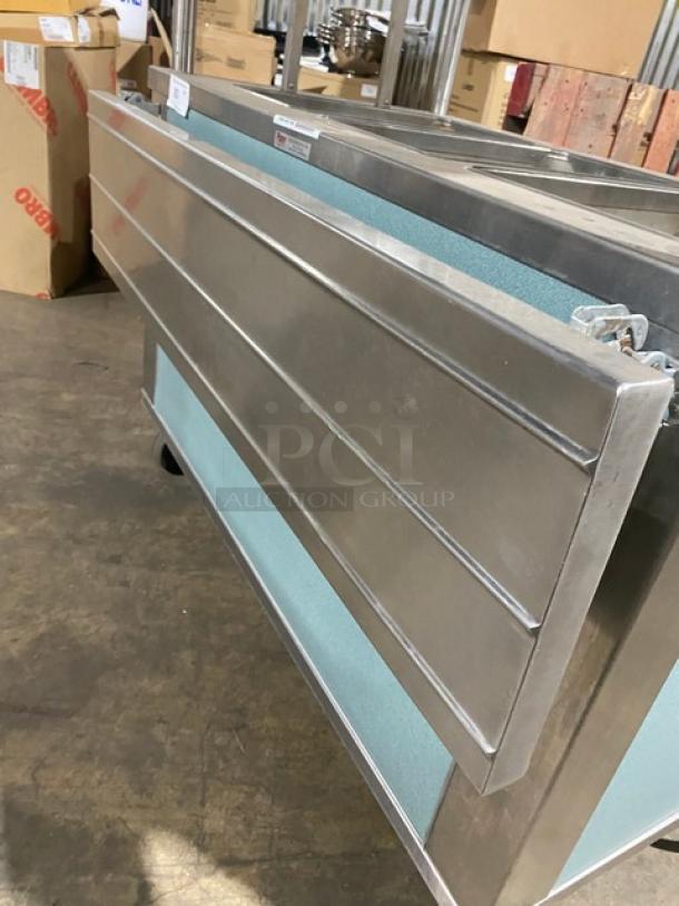 Piper Products 3HF stainless steel 3-well hot food table, electric, with tray slide, sneeze guard, and awning. Enclosed base.
