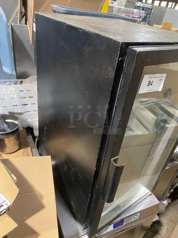 Beverage-Air UR30G countertop merchandiser fridge, black, single glass door, poly coated wire racks, minor scratches.