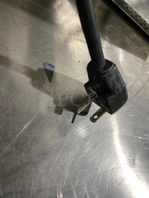 Electric plug for Panasonic NE-17521 commercial stainless steel microwave oven, showcasing 208V plug configuration.