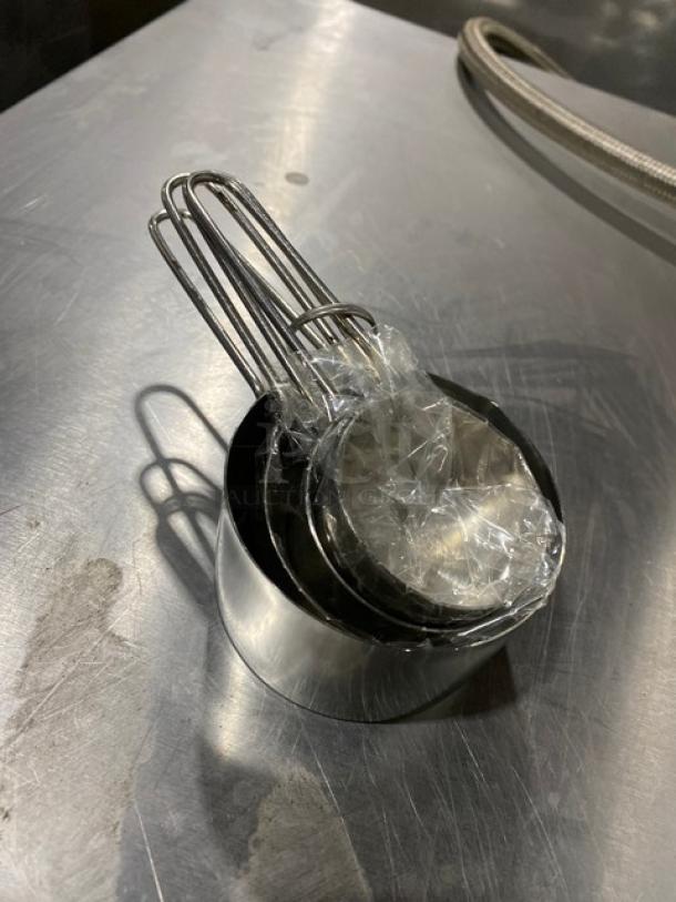 American Metalcraft MCW-4 stainless-steel measuring cup set, heavy-duty, commercial grade, wrapped handles, new condition.