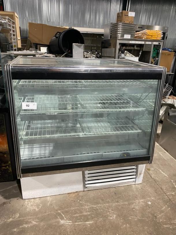 American Metalcraft MCW4 white glass refrigerated meat/deli merchandiser display case with poly coated wire racks, rear sliding doors.