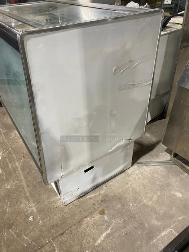 American Metalcraft MCW4 refrigerated display case with white straight glass, poly coated wire racks, and rear sliding doors.