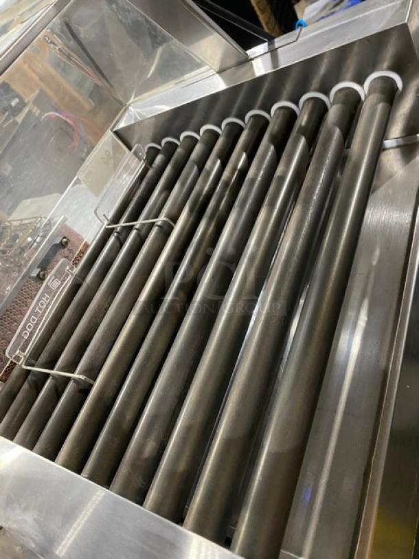 Star Commercial Electric Hot Dog Roller, Model 258, stainless steel with clear cover, on legs, 120V, serial 25024209.