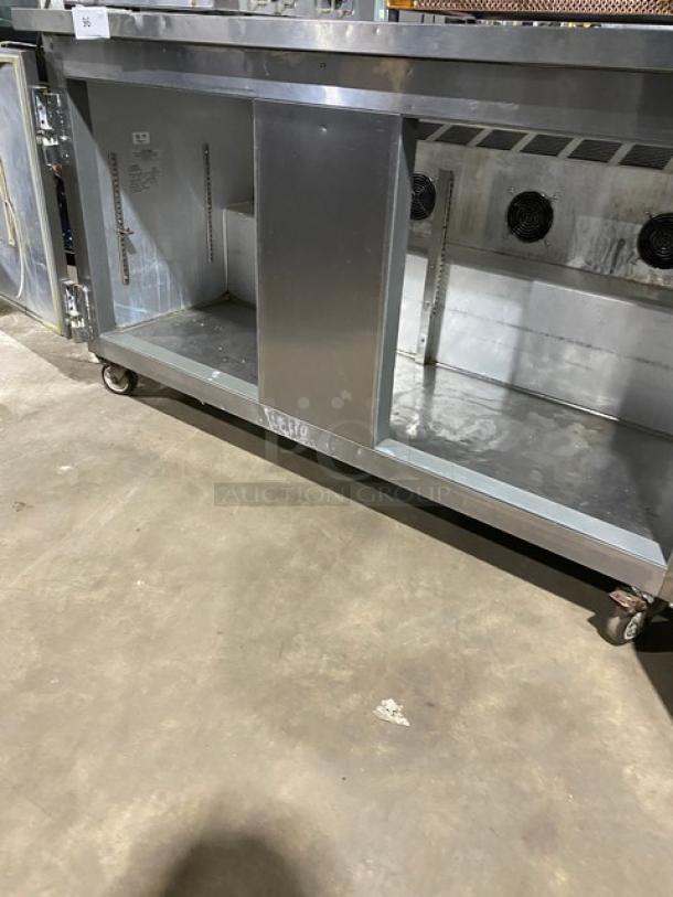 Leader ESLB60SC stainless steel 2-door undercounter refrigerator on casters, open doors, clean interior, Model: ESLB60 S/C SN: NL10S1103.
