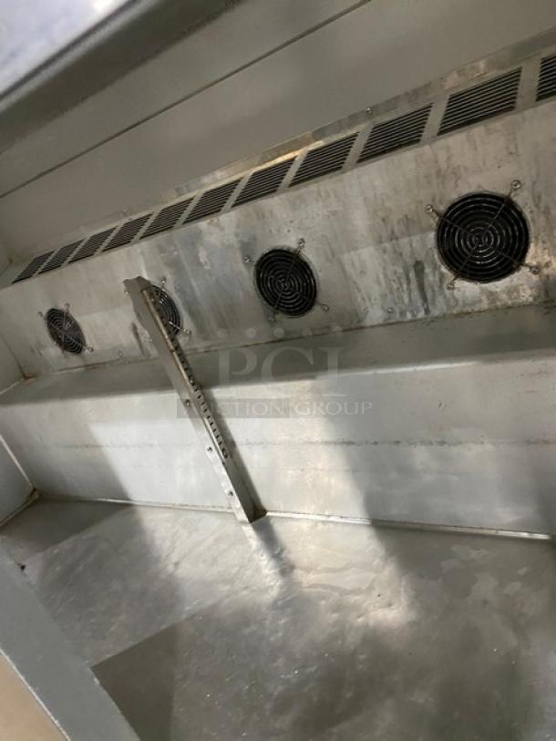 Leader ESLB60SC stainless steel undercounter refrigerator interior, showcasing fan vents and metal surface. Good condition.