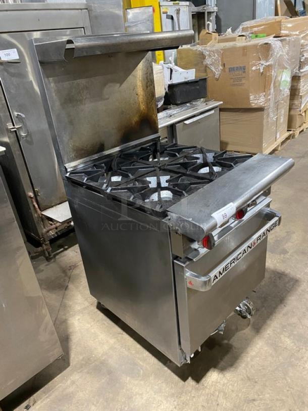 American Range stainless steel 4-burner gas range/oven combo with back splash, overhead salamander shelf, and wired oven rack on casters.