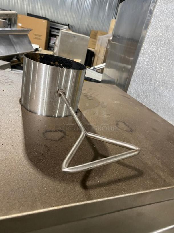 Commercial stainless steel smokehouse oven with a right-side hinged door, powered by natural gas, shown on sturdy legs.