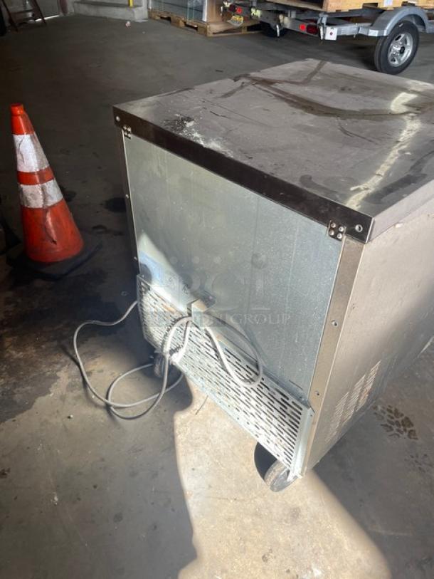 Master-Bilt Fusion Series stainless steel undercounter refrigerator Model UR27, Energy Star certified, on casters, with wiring.