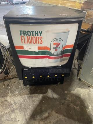 Curtis PCGT6300 countertop 6-flavor cappuccino dispenser, black, with digital controls, 120V, 7-Eleven branding, used condition.