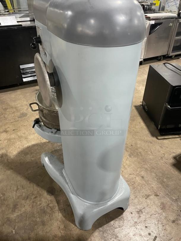 Hobart H600 commercial 60 qt. mixer with stainless steel bowl and spiral dough hook, 208V 3 phase, on legs.