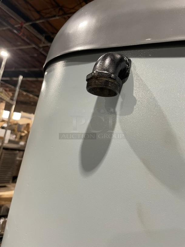 Hobart H600 commercial electric mixer with 60 qt. stainless steel bowl, spiral dough hook, and legs, model SN: 1661999.