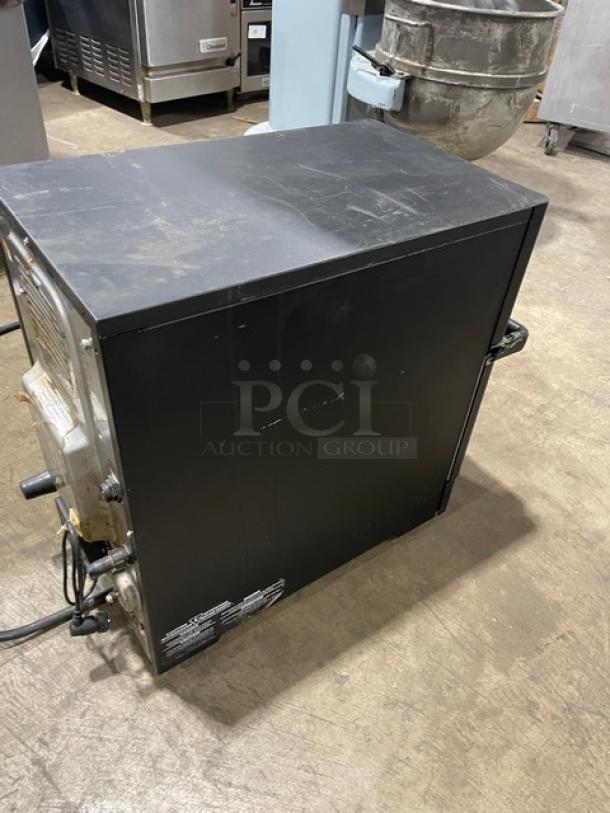 MerryChef Eikon E2S high-speed cook oven, black, electric, 208/240V 1 phase. Used condition with visible wear.