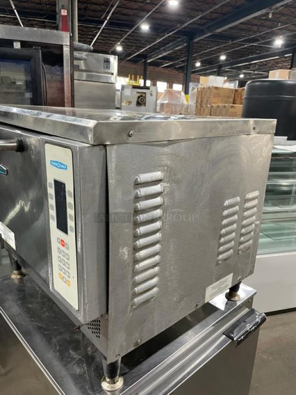 TurboChef NGC ventless rapid cook oven with digital controls shown on a double undershelf equipment cart. Used condition.