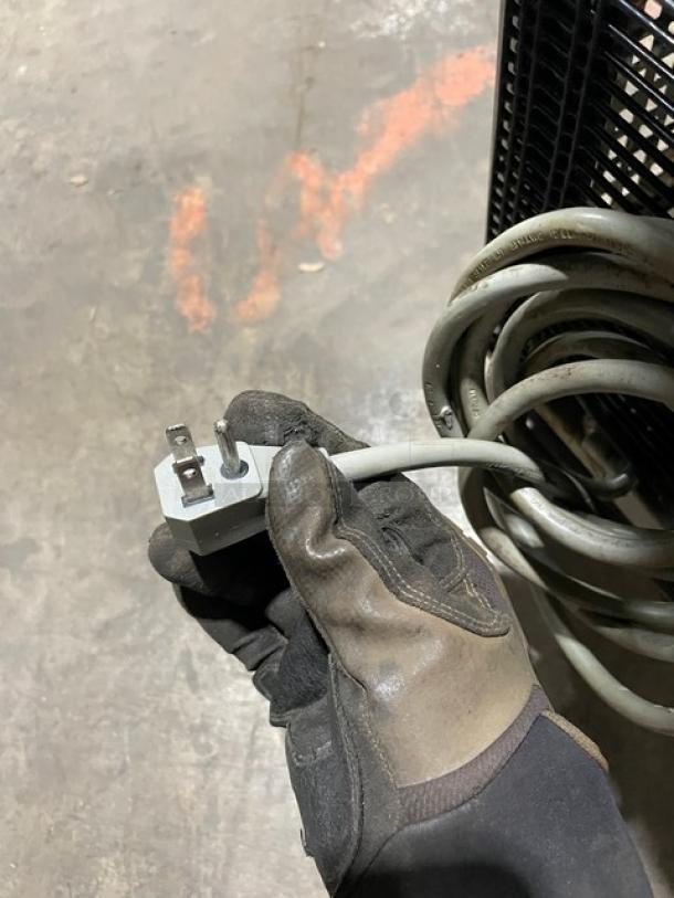 Turbo Air M3 Series single-door refrigerated prep table plug and coiled cord. Model MST-28, 115V, on casters.