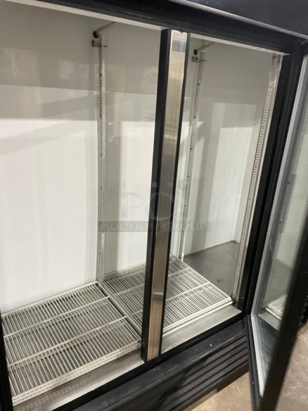 True Commercial Black Triple Glass Door Merchandiser Refrigerator, Model GDM-72, with poly coated wire racks, 115V, 1 phase.