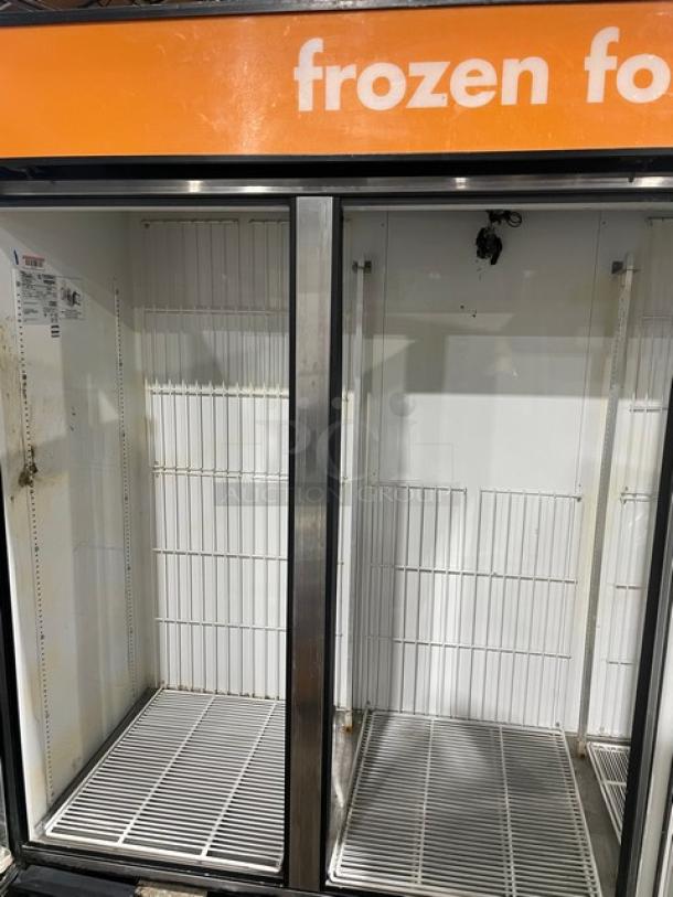 True GDM-72F commercial freezer, black triple glass doors, poly-coated wire racks, 115/208-230V 1-phase, SN: 7428941.