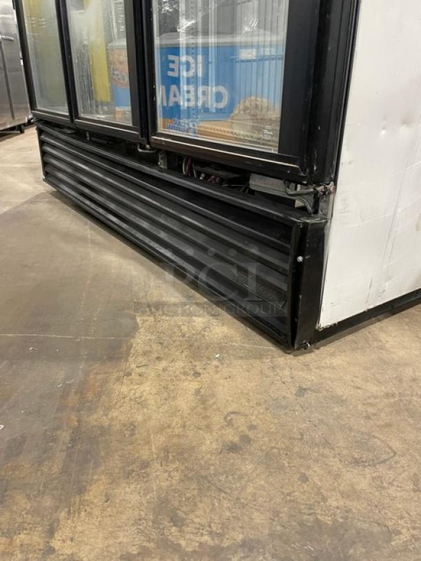 True Commercial Triple Glass Door Merchandiser Freezer, Model GDM-72F, poly-coated wire racks, black finish, 115/208-230V, 1 Phase.