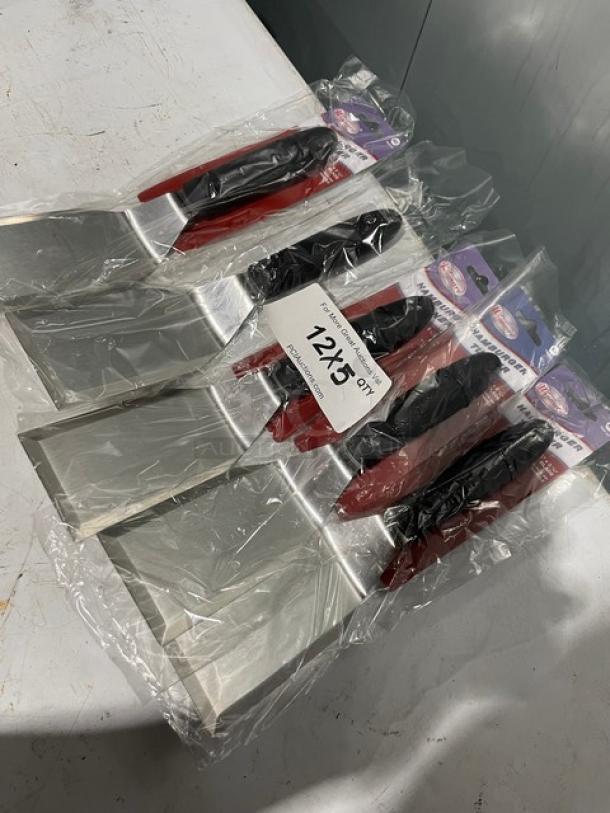 NEW Winco Stainless Steel Offset Hamburger Turners, Model TKP-61, with black grip handles in packaging.