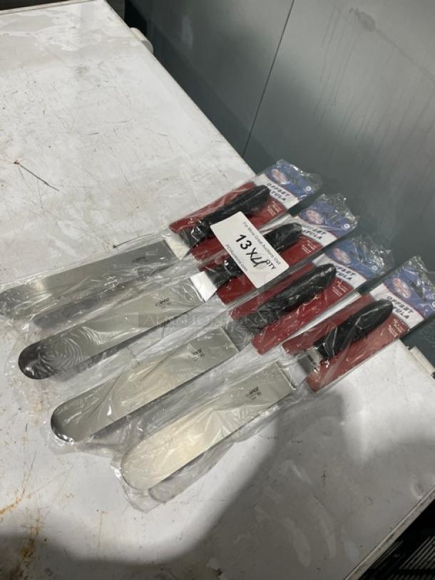 Winco Winware TKPO-9 stainless steel offset spatulas, new with black grip handle, in packaging. Set of five.
