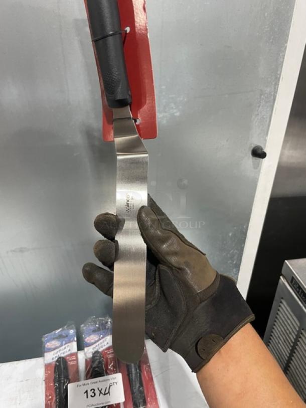 Winco Winware Series offset spatula, model TKPO-9. Stainless steel with black grip handle. New condition.