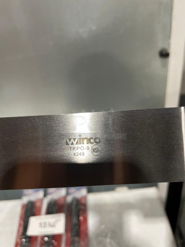 New Winco Winware Series stainless steel offset spatula, model TKPO-9, with black grip handle, NSF certified.