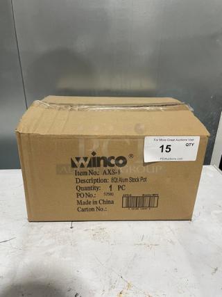 New Winco AXS-8 aluminum 8 qt stock pot in box with handles, model AXS8. Box labeled with item details.
