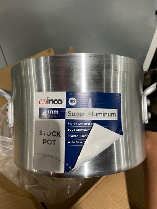 Winco AXS-8 aluminum stock pot, 8 qt., reinforced, with handles, new condition. Label shows 4mm thickness, NSF certified.