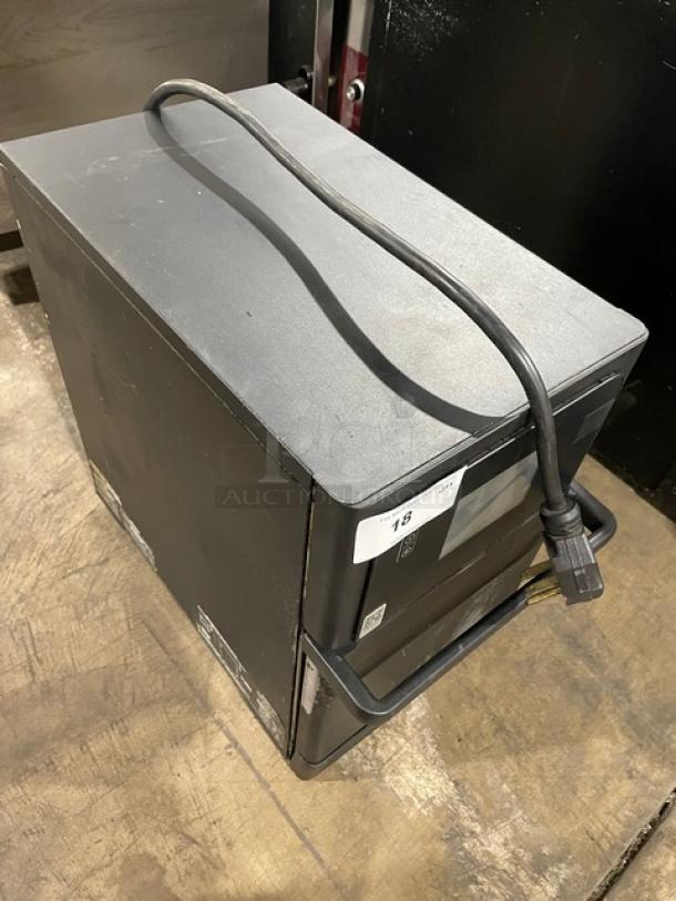 MerryChef Eikon E2S black electric rapid cook oven, 208/240V, 1 phase, in good condition with visible power cord.
