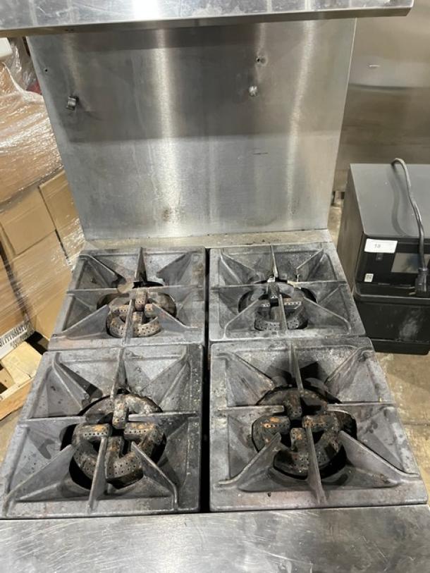 CPG Commercial Stainless Steel 4 Burner Range/Oven Combo, Model 351S24N, with back splash, salamander shelf, on casters.