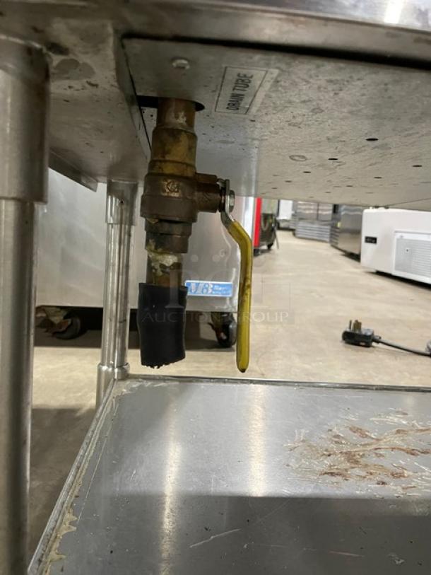 Eagle Group stainless steel gas-powered 3-pan hot food/steam table with tray slide, single undershelf, and visible valve connection.