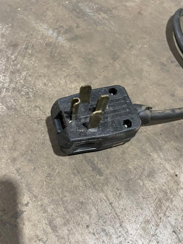 Black electrical plug for Eagle Group gas-powered hot food steam table.