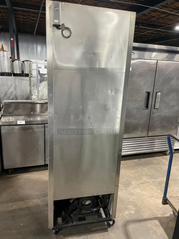 True T-23 Commercial Stainless Steel Single Door Refrigerator, Energy Star Certified, on casters, visible dings, industrial setting.