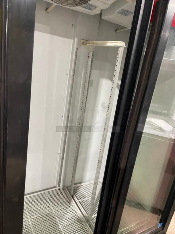 Imbera VRD37C02 Coca-Cola style commercial refrigerator, black with double glass sliding doors. Energy Star certified, on casters.