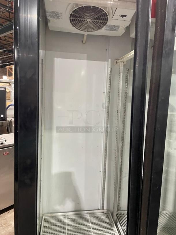 Imbera VRD37C02 Coca-Cola style black merchandiser refrigerator, double glass sliding doors, poly coated wire racks, on casters.