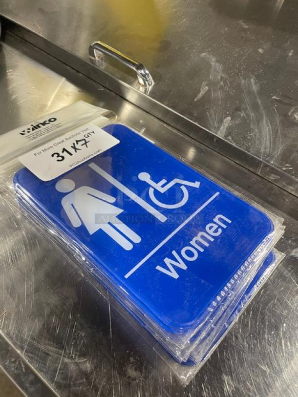 Winco Model SGN651B blue "Women/Accessible" sign, new condition, 7x bid, visible icon for accessibility.