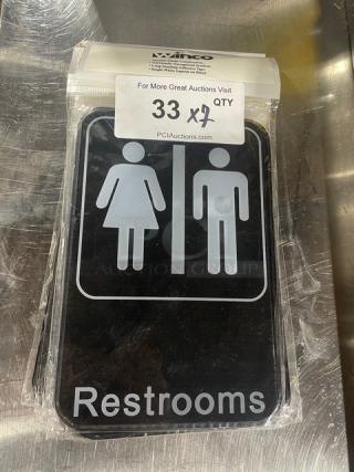 Winco SGN-603 commercial black "Restrooms" sign, new in packaging, featuring male and female symbols.