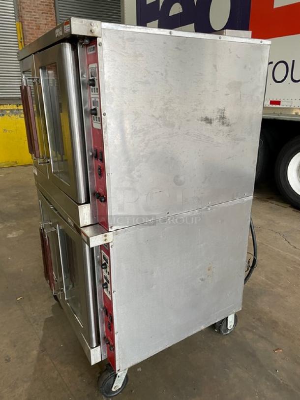 Vulcan stainless steel double stacked convection oven, electric, wired racks, on casters, used condition.