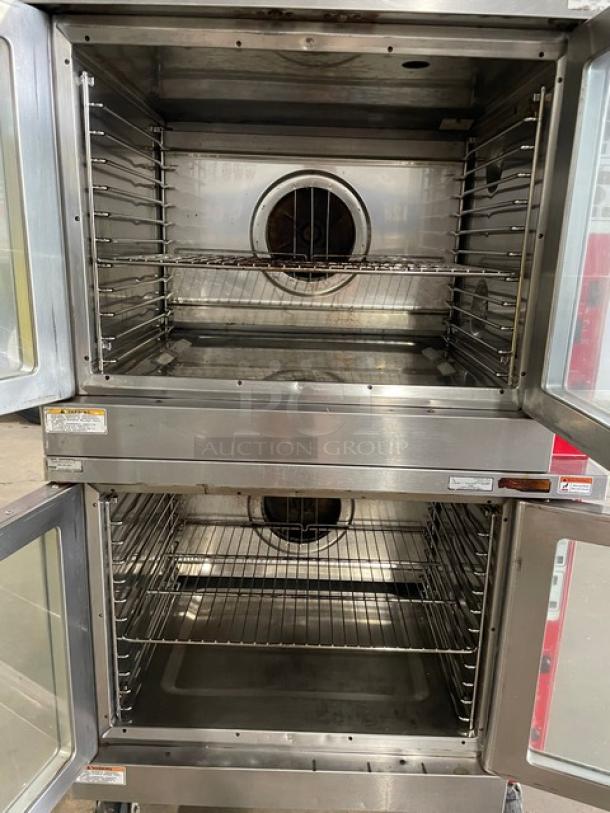Vulcan commercial double-stacked stainless steel convection oven on casters, includes wired racks. Excellent condition.