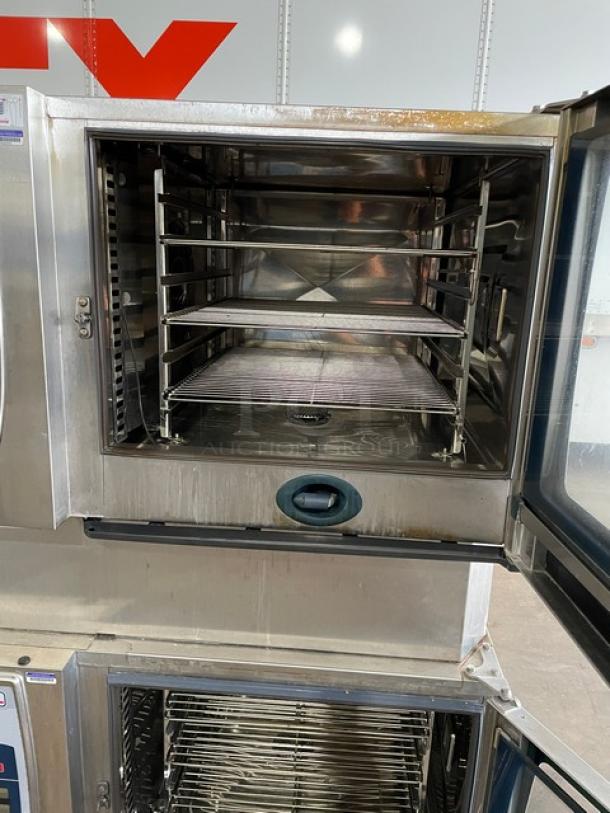 Rational SCC62G Combi Oven, stainless steel, double stacked, natural gas, wired racks, blue gas connector, on casters.