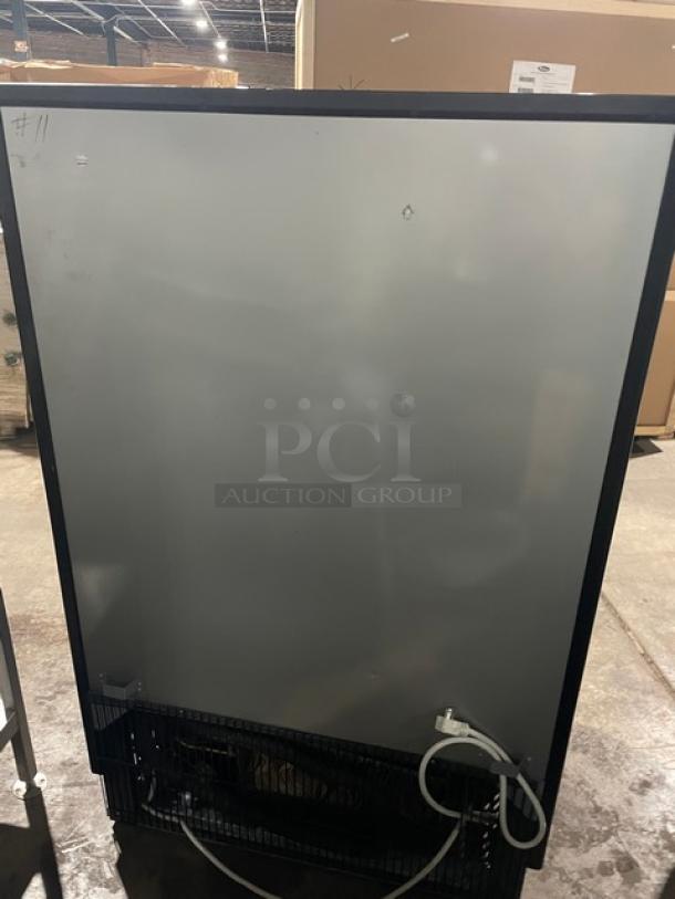 Turbo Air TOM-40MB refrigerated open display case, stainless steel interior, 120V, commercial-grade, back view.