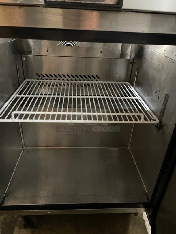 Atosa 2019 commercial stainless steel single door refrigerated prep table, model MSF8301GR, with poly coated wire rack.